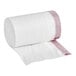 A roll of white plastic bags with pink drawstrings.