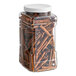 A clear container filled with Badia cinnamon sticks.