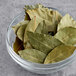 A bowl of Badia Whole Bay Leaves.