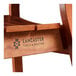 The Lancaster Table & Seating logo on a Tigerwood slat back.
