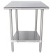 An Advance Tabco stainless steel work table with a shelf.