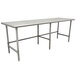 An Advance Tabco stainless steel work table with galvanized steel legs.