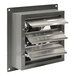 A metal wall exhaust fan with a fan in a metal vent.
