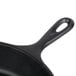 An Elite Global Solutions black faux cast iron fry pan with a handle.