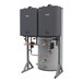 A room with two Rinnai Demand Duo water heaters with grey tanks and pipes.