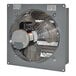 A Canarm metal wall exhaust fan with a round metal blade.