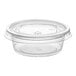 A clear plastic Choice souffle cup with a lid.