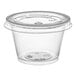 A clear plastic Choice souffle cup with a lid.