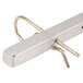 A metal bar with a metal ring on the end.