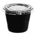 A Choice black plastic souffle container with a clear plastic lid.