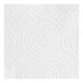 A close-up of a white Lavex paper towel with dots.