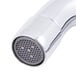 A close-up of a Equip by T&S deck-mounted faucet with wrist handles and a chrome finish.