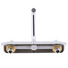 A silver Equip by T&S deck-mounted faucet with gold fittings and lever handles.