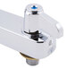 A chrome Equip by T&S deck-mounted workboard faucet with blue lever handles.
