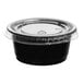 A black plastic Choice souffle container with a clear lid.