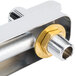 A chrome Equip by T&S deck mount faucet base with a metal nut on the bottom.