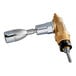 A close-up of a brass and silver Estella Caffe hot water faucet assembly.