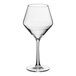 A clear wine glass with a stem.