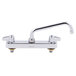 A close-up of a chrome Equip by T&S deck-mounted faucet with two lever handles.