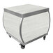 An Eastern Tabletop white wash laminate serving cart with stainless steel accents on wheels.