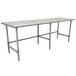 A long stainless steel work table with galvanized steel legs.