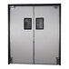 A white Aleco single swinging traffic door with black rectangular windows.