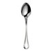A close-up of a WNK Leopardi stainless steel spoon with an oval bowl and a handle.