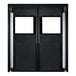 A black rectangular double swinging traffic door with white square windows.
