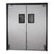 A white Aleco double swinging traffic door with black rectangular windows.