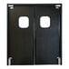 A black double swinging traffic door with rectangular windows.