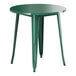 A Lancaster Table & Seating emerald green metal table with legs.