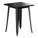 A Lancaster Table & Seating Onyx black metal square table with legs.
