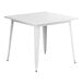 A Lancaster Table & Seating pearl white table with metal legs.