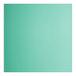 A close-up of a green square surface with white border.