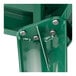 The green metal surface of a Lancaster Table & Seating outdoor table.