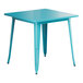 A turquoise square table with metal legs.