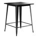 A Lancaster Table & Seating Onyx Black Bar Height Outdoor Table with legs and a square top.