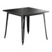 A Lancaster Table & Seating distressed onyx black square table with metal legs.