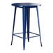 A Lancaster Table & Seating blue metal bar height table with a round top.