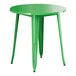 A Lancaster Table & Seating jade green table with metal legs.