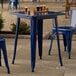 A blue table with drinks on it.