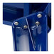 A close-up of a blue metal piece with screws for a Lancaster Table & Seating Sapphire Outdoor Table.