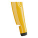 A yellow plastic table top with a black base.