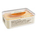 A plastic container of Hometown Provisions honeycomb with an orange label.