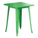 A Lancaster Table & Seating green metal table with legs.