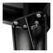 A close-up of a black metal Lancaster Table and Seating outdoor table.