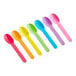 A row of colorful plastic frozen yogurt spoons.