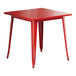 A red square Lancaster Table & Seating outdoor table with legs.