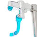 A close-up of a blue and silver Equip by T&amp;S deck mount glass filler faucet with a handle.