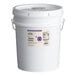 A white Hometown Provisions bucket with a lid and a label.